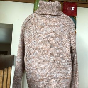 Pink knit turtleneck sweater